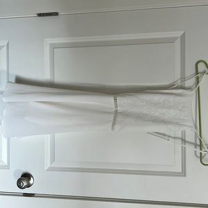 White knee length dress